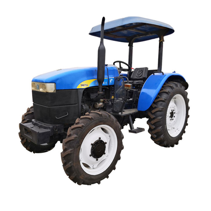 New Holland SNH704 used tractor engine and cab detail