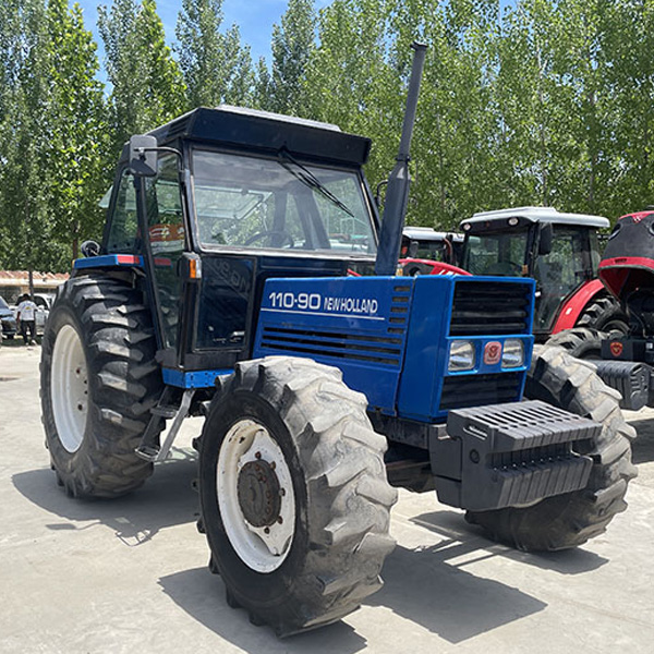 New Holland 110-90 used tractor with cab and dry land tyres
